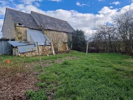 terrain constructible 595m² avec grange
