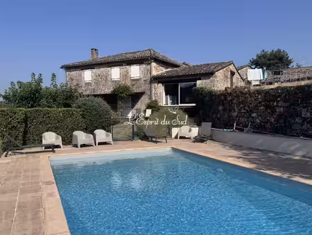 deux maisons en pierre  piscine et terrain de 1 8 ha