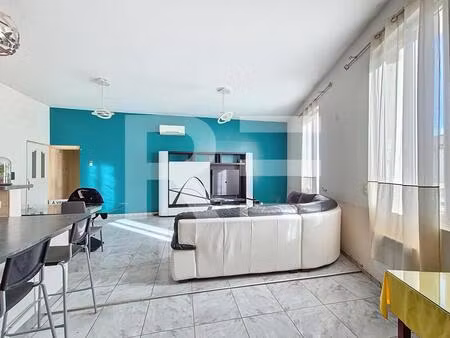 beau t3 au 1ier etage de 104 m2 en centre de lunel avec possibilite place garage