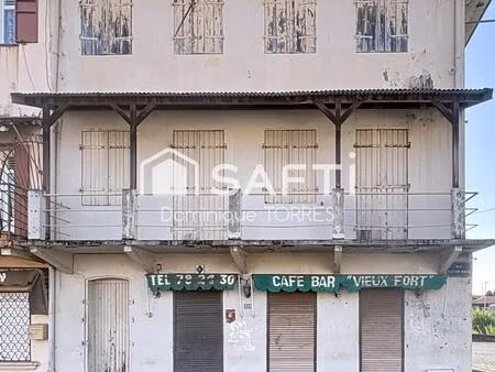 saint-pierre : immeuble de 288m² vue mer et montagne