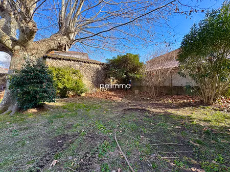 grans - terrain constructible 168m² avec grange