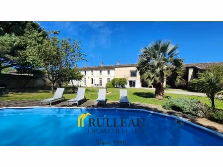 propriété d’exception en pierre 330m2 parc paysagé avec piscine proche bordeaux