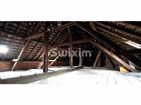 combles aménageables de 110m² habitables avec cave et parking privé