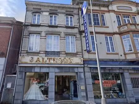 immeuble mixte: commerce et 2 appartements 1 ch