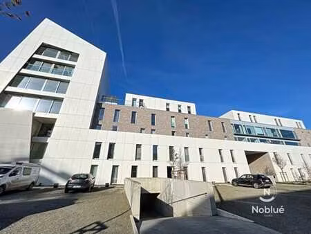 hermalle : app 2 ch + terrasse + garage