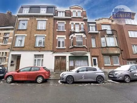 a vendre à anderlecht : immeuble rez commercial et 2 logemen