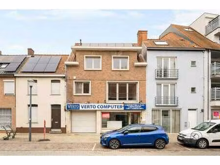immeuble commercial avec logement  garage et terrasse