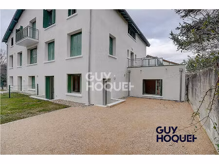 appartement 2 pieces de 50 70 m² - 1 jardin privatif de 74 m² + 1 stationnement