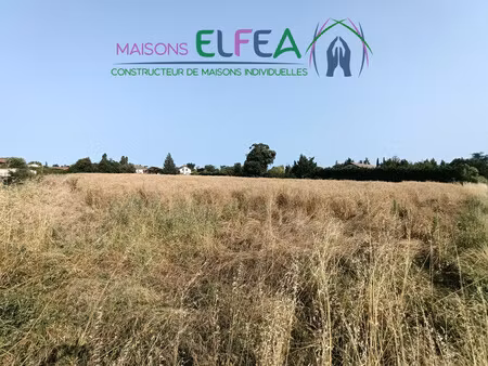 magnifique terrain plat et viablisé  proche des commerces à beau