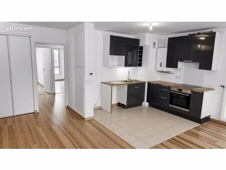 appartement 60m2 avec balcon et 2 places de parking