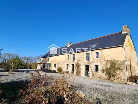 longère d'environ 200 m2 habitables avec vie de plain-pied