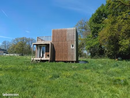 vente terrain constructible (2172m2) et petite maison en bois