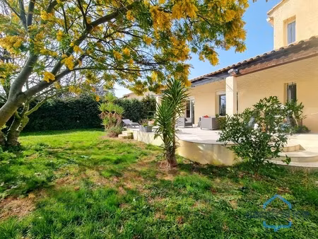 maison individuelle rénovée de 110m² avec 4 pièces + une véranda sur un terrain arboré de 