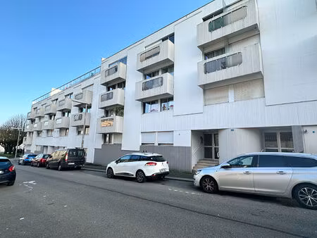 hyper centre - t2 de 50 m² avec ascenseur et parking