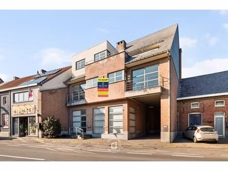 veelzijdig investeringspand met 3 app.  magazijn  staanplaatsen en handelspand