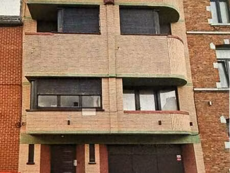 immeuble comprenant 2 appartements