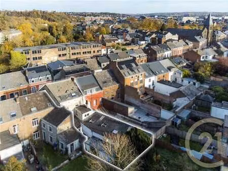 immeuble mixte : commerce + 4 appartements