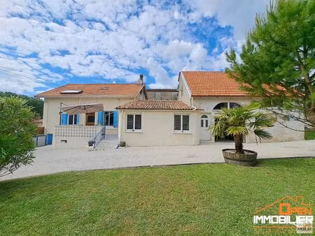 maison avec garage  sous-sol  cave et jardin clos - 187 m² - 7 pièces