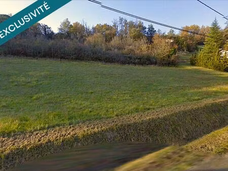 terrain constructible 2320 m2 + 1992 m2 de bois