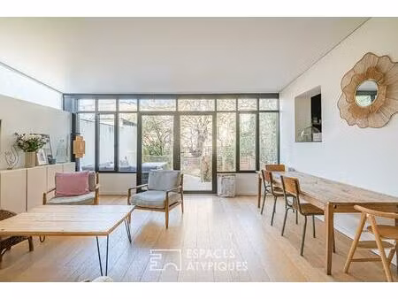 appartement traversant avec terrasse et jardin