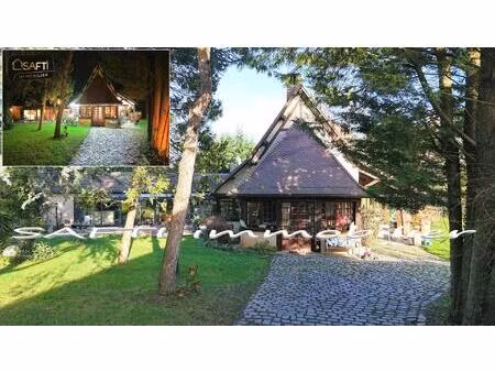 propriété de 10 pièces  5 chambres  2 vérandas  piscine d'intérieur  terrain clos de 3500m