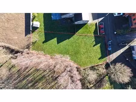 terrain à bâtir situé dans un clos à alleur (ans)
