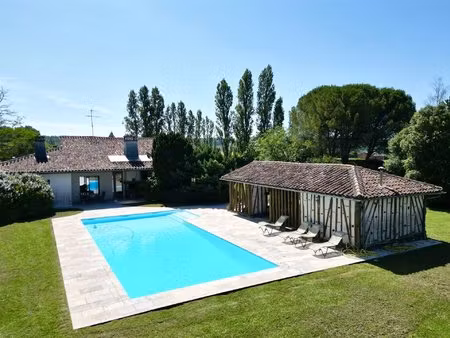 a 5 minutes de casteljaloux - propriété de 3 chambres avec piscine