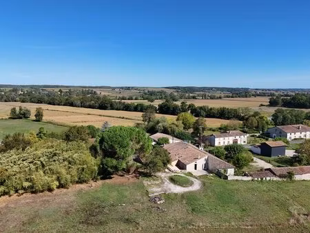 proche de monségur - charmante propriété de deux maisons en pierre avec superbe vue sur la