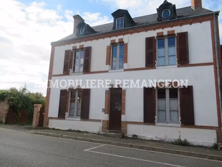 maison en plein centre du village