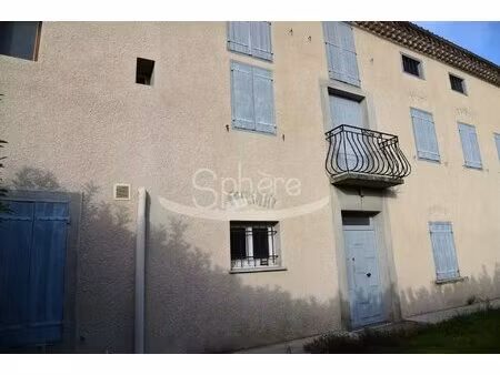 maison en pierre avec jardin et garage