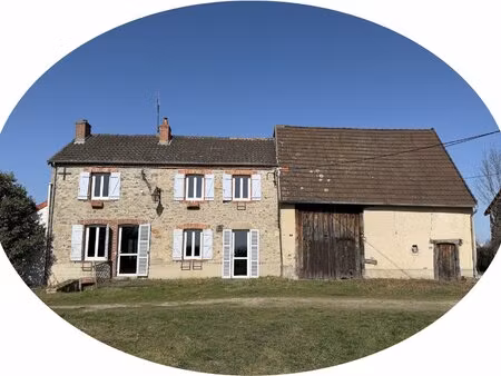 auv 1212 : maison avec grange attenante  garages et 6570m2 de terrain