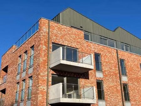 appartement 2 chambres neuf + parking + cave