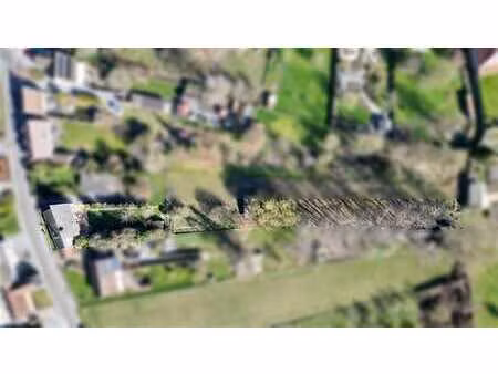 bonne maison d’habitation semi-plain-pied au cœur du village