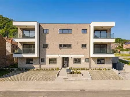 nouv. construction : appart rez  3 ch.  cour-jardin & parkin