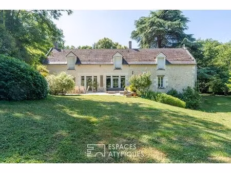 ancien moulin d'exception au coeur d'un écrin de verdure