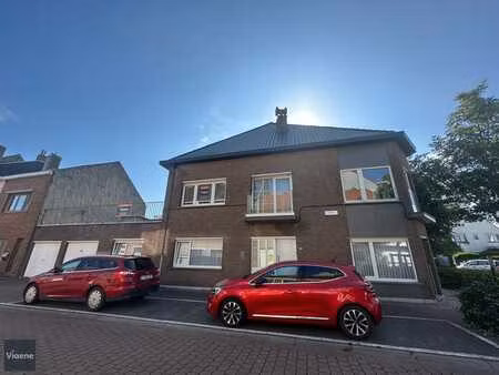 opbrengsteigendom met 2 appartementen én 2 garages