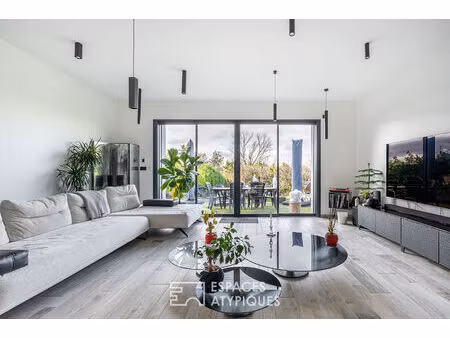 maison contemporaine rénovée avec extension et toit-terrasse à saint-pierre-de-chandieu