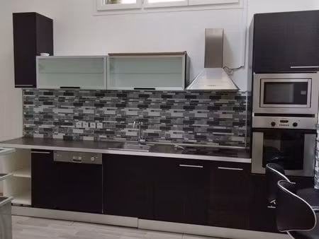 florensac centre – appartement t1 duplex avec mezzanine  cuisine aménagée et climatisation