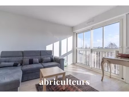 appartement traversant - 3 pièces - 64 m² - cave et parking - bois d'arcy