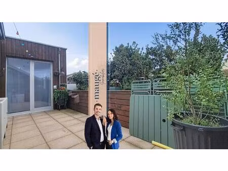 appartement - 2 chambres - terrasse - une place de parking - un garage en sus - au calme