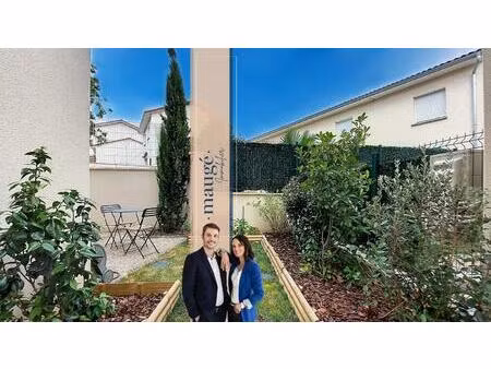 appartement - 2 chambres - 1 bureau - jardin - 1 place de parking - au cœur du village - p