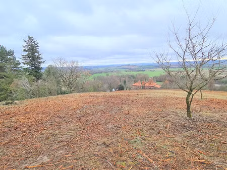 giroussens rare beau terrain de 1051 m2 en pente avec vue imprenable sur toute la vallée
