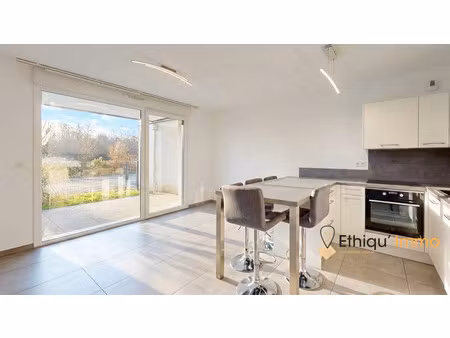 2 pièces - rez-de-jardin - garage - cave