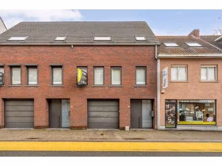 instapklare bel-etagewoning met dubbele garage en tuin in het centrum van retie
