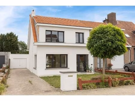 in optie !! instapklare woning met zonnige tuin op uitstekende ligging