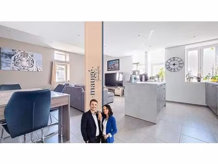 appartement - 3 chambres - 2 places de stationnement - cave - terrasse - au cœur du villag