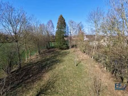 magnifique terrain à bâtir lumineux au calme