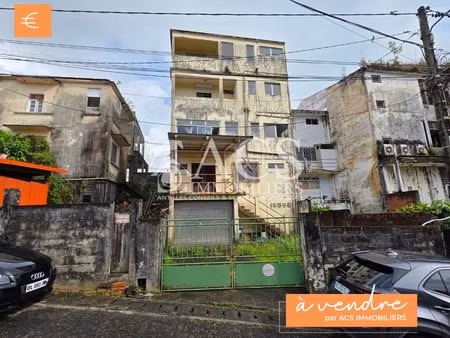 a vendre immeuble de rapport mixte avec commerces et appartements au cœur du bourg du...