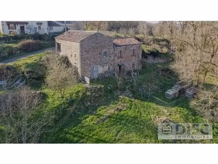 maison en pierre à rénover avec grange attenante et beau terrain
