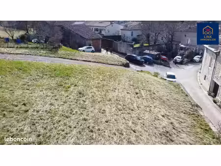 terrain 1200 m² combovin